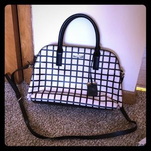 Kate Spade Handbag. Super cute with strap.